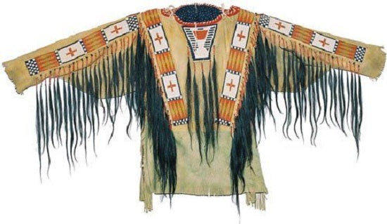Traditional Native American beaded and fringed garment on a white background