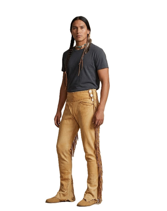 Person wearing tan fringed pants and a dark shirt on a white background
